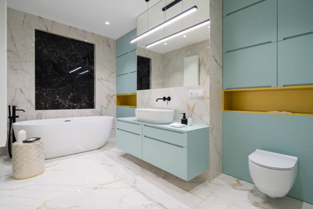 Spacious and modern bathroom with bathtub stock photo