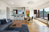 istock Spacious apartment with window wall 1289883686