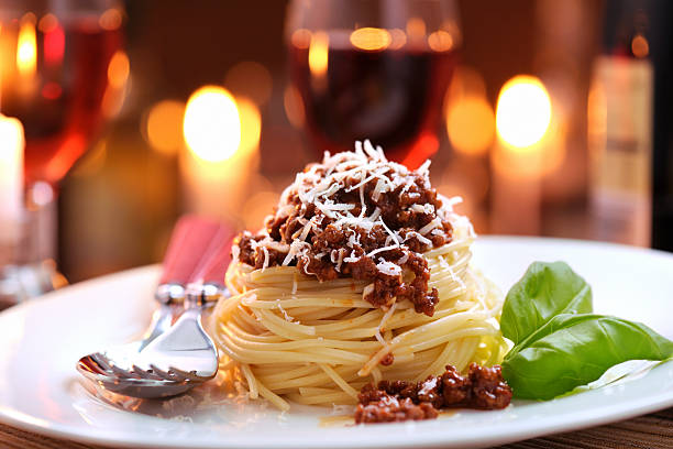 Spaghetti bolognese with parmesan cheese stock photo