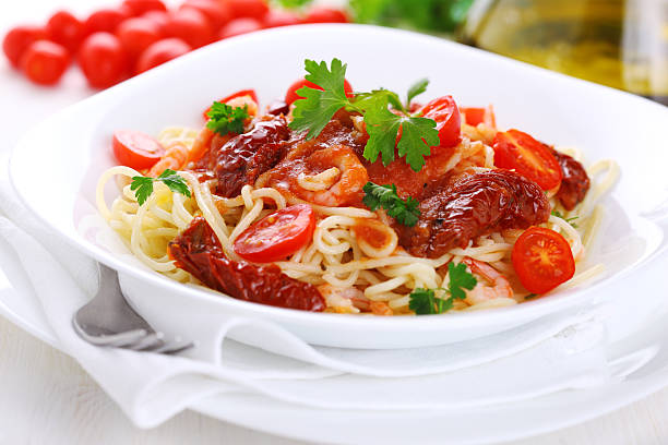 Spaghetti with tomato sauce stock photo