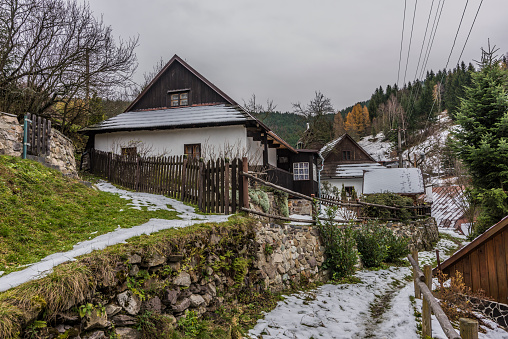 Spania Dolina village in dark cold autumn day with snow
