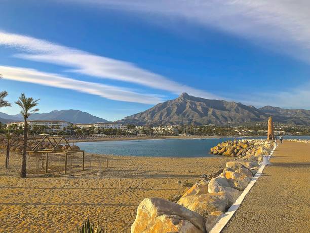Spanish Beache Marbella Beach and Mountain marbella stock pictures, royalty-free photos & images