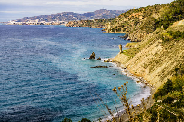 Spanish coast landscape, cliffs in Andalusia. Spanish coast landscape in Andalucia. Cliffs of Maro Cerro Gordo Natural Park, near Maro and Nerja, Malaga province, Costa Del Sol, Spain. nerja stock pictures, royalty-free photos & images