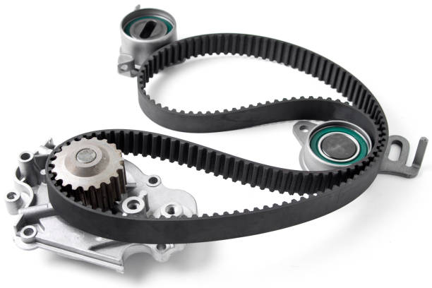 Spare parts for the car. Kit of timing belt with rollers on a light background. stock photo