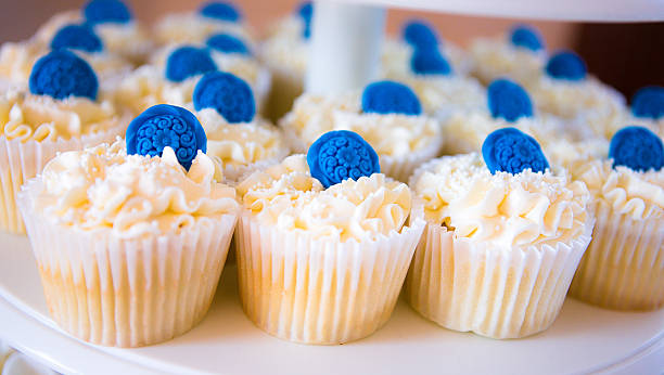 Fancy blue and white cupcakes for special events of your life such as a wedding, baptism, graduation party, etc.
