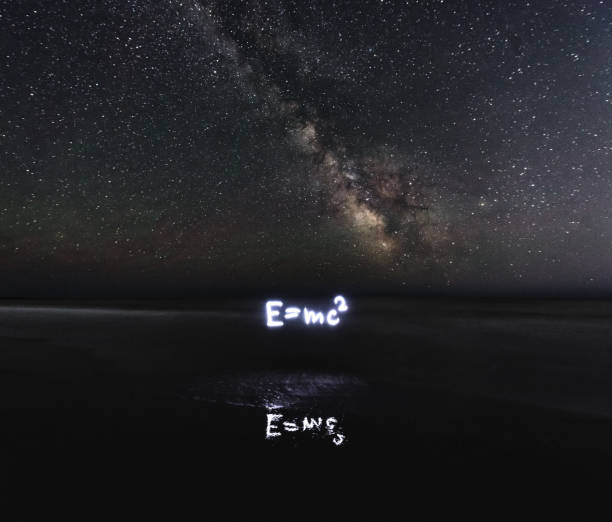 Special Relativity Einstein's theory of special relativity under the Milky Way.  Long exposure with light painted text. albert einstein stock pictures, royalty-free photos & images