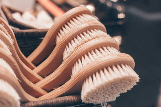 Special wooden anti-cellulite brushes in the shop. Anticellulite massage device in the showcase. stock photo