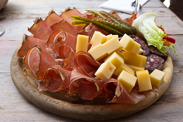 Speck and cheese cold cuts platter - South Tyrol stock photo