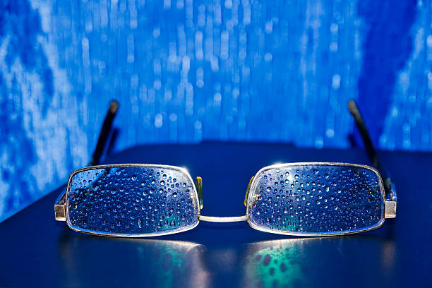 Spectacles of water droplets on the glasses stock photo
