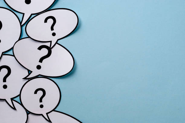 Speech or thought bubbles with question marks Speech or thought bubbles with question marks forming a side border over a blue background with copy space question mark photos stock pictures, royalty-free photos & images