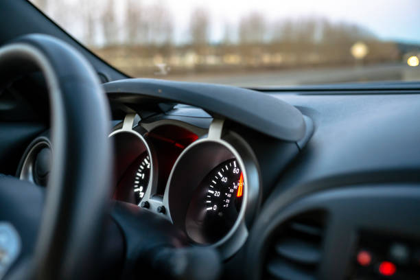 Speedometer of car driving on the road stock photo