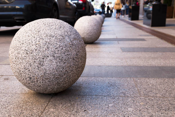 Sphere ball stone Bollards stock photo