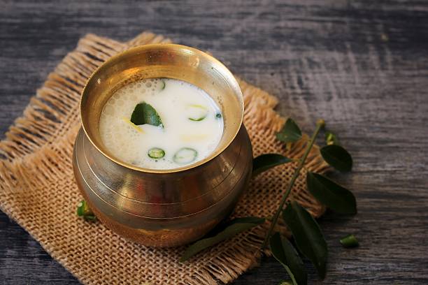 Spiced buttermilk, selective focus Spiced buttermilk / Sambaram -Refreshing summer drink with buttermilk, selective focus buttermilk stock pictures, royalty-free photos & images