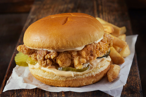 Spicy Crispy Fried Chicken Burger with Spicy Mayo, Pickles and French Fries