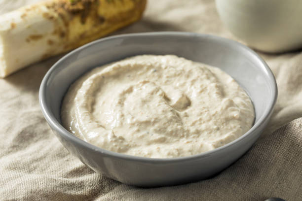 Spicy Homemade Horseradish Sauce Spicy Homemade Horseradish Sauce in a Bowl horseradish stock pictures, royalty-free photos & images