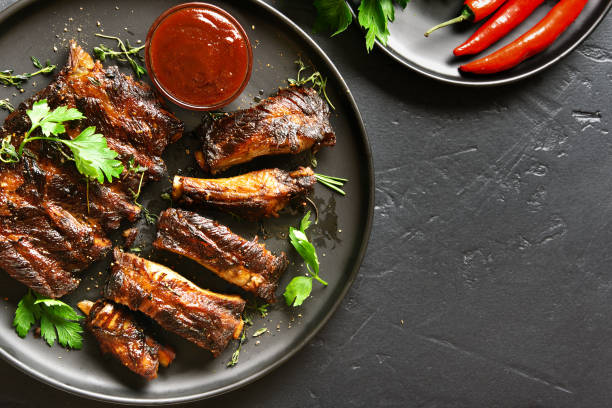 Spicy hot grilled spare ribs on plate stock photo