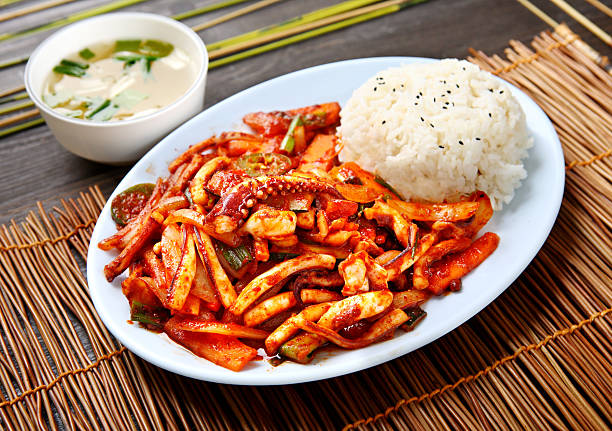 Spicy Squid Korean Style Spicy Squid with Steamed Rice & Soup korean culture photos stock pictures, royalty-free photos & images