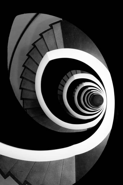 Spiral staircase with green color forming a beautiful shell pattern stock photo