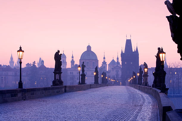 Spires of Old Town in Prague from Charles Bridge  charles bridge stock pictures, royalty-free photos & images