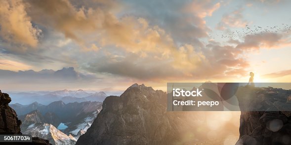 istock Spiritual Seeker Meditating High On Mountain Top At Sunset 506117034