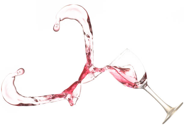 Splash of water from a glass of wine stock photo