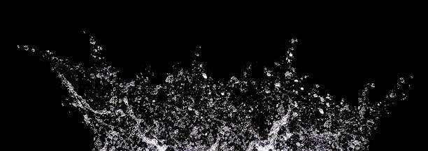 黒い背景に水の飛沫と滴。抽象的または背景画像、選択的な焦点。バナー - 水しぶき ストックフォトと画像
