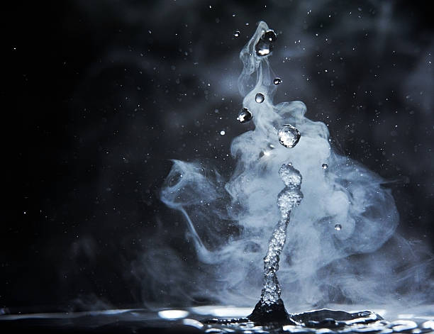 splashes of hot water stock photo