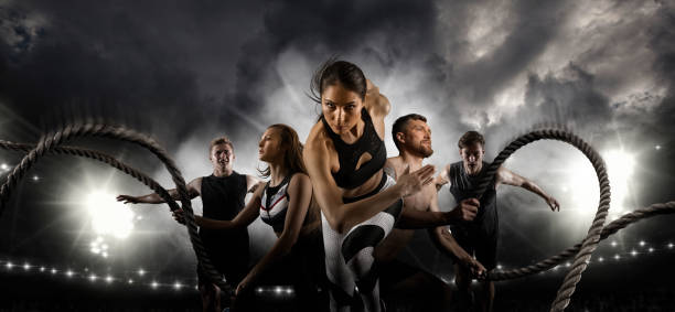 Sport collage. Men and woman running on smoke background stock photo
