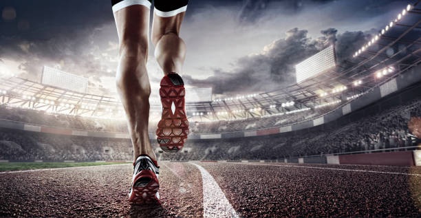 Sports background. Runner feet running on 3d render stadium closeup on shoe. Dramatic picture. stock photo