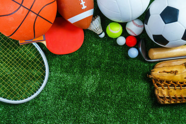 Sports Equipment on green grass, Top view Sports Equipment on green grass, Top view sporting goods stock pictures, royalty-free photos & images