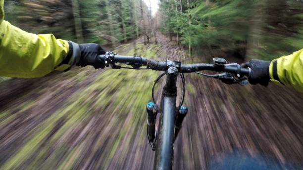 POV Sports mountain bike downhill through a woodland area in Oxfordshire, England stock photo