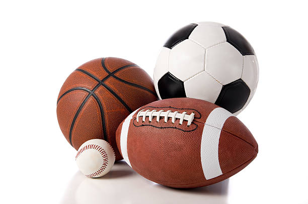Sports Objects A variety of sports balls including a football, basketball, baseball and a soccer or European football sporting goods stock pictures, royalty-free photos & images