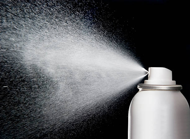 spray bottle  deodorant stock pictures, royalty-free photos & images