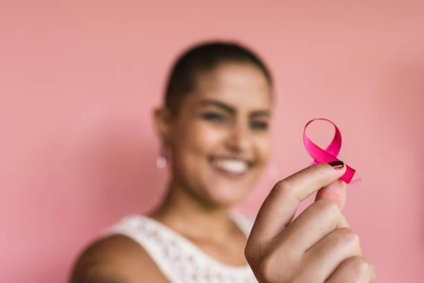 распространение кампании pink october - breast cancer стоковые фото и изображения