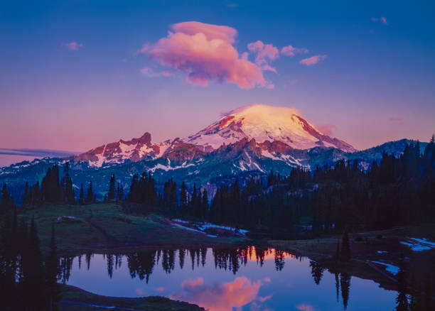 Spring morning in the Cascade Range with reflection of Mount Rainier, WA vacation get away; getting away from it all; travel adventure; mountain wonderland mt rainier stock pictures, royalty-free photos & images