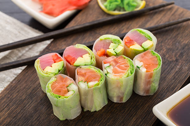 Spring rolls with tuna and salmon stock photo