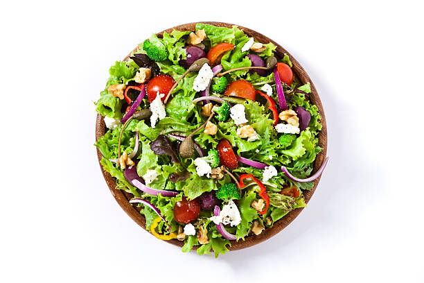 insalata di primavera, girato dall'alto su sfondo bianco - insalata foto e immagini stock