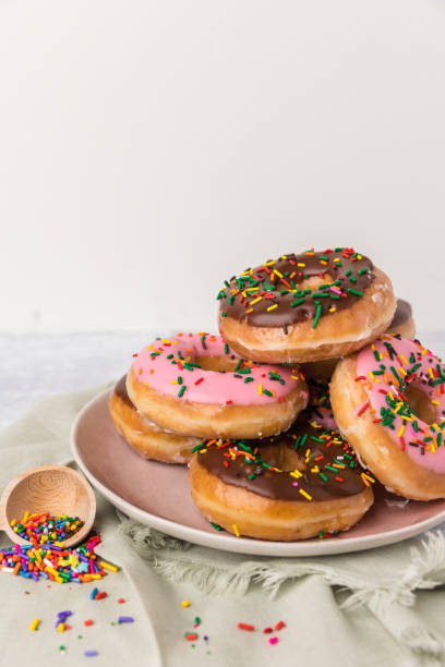 Sprinkle Donuts on a plate stock photo