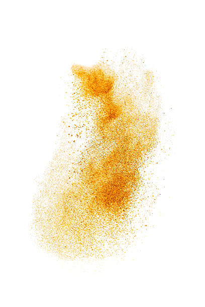 Sprinkled curry pwder Turmeric or curry powder flying , studio shot, selective focus. curry powder stock pictures, royalty-free photos & images