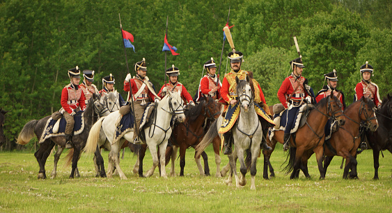 Participants of the military historical reconstruction of the events of the Napoleonic Wars on the Borodino field in the Moscow region during the holiday 