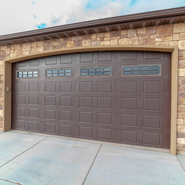 Square frame Large closed double wooden garage door day light stock photo