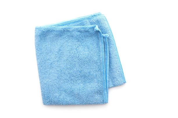 Square kitchen rag isolated on white, blue cloth top view stock photo