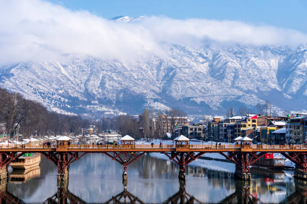 Srinagar Kashmir Beautiful scenery of Zero bridge with Himalaya mountain covered with snow in the background. jammu and kashmir stock pictures, royalty-free photos & images