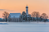 Beautiful St. Coloman Church (Schwangau, Bavaria, Germany) on Winter Sunset
