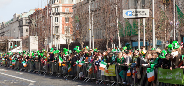 Dublin, Ireland - 17 March, 2011: People line the streets in the city of Dublin as they wait for St. Patrick\\'s Day Parade to begin.