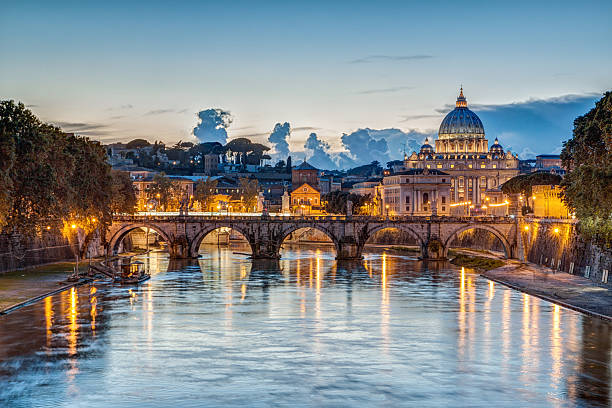 St. Peter’s Basilica at dusk in Rome, Italy St. Peter’s Basilica at dusk in Rome, Italy basilica stock pictures, royalty-free photos & images