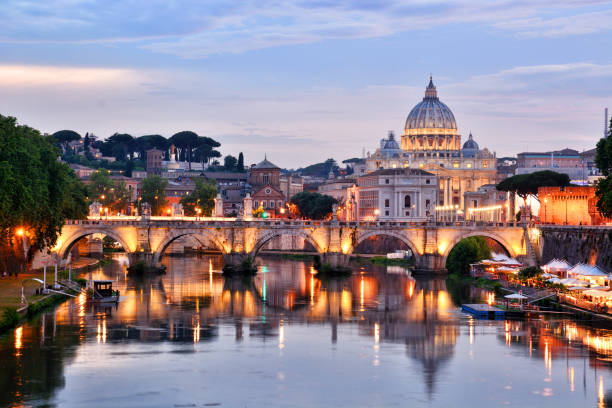 St. Peter's Basilica, Vatican St. Peter's Basilica in Vatican and Tiber river in Rome at sunset basilica stock pictures, royalty-free photos & images