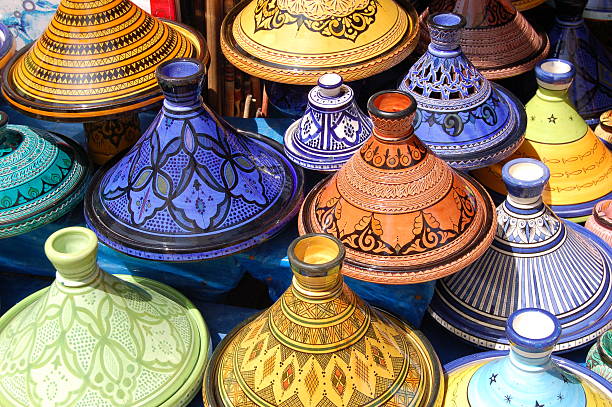 Stack of beautiful colored Moroccan Tajine pots stock photo