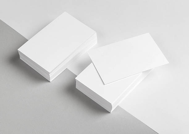 A stack of blank business cards and letterhead Photo of business card & part of the Letterhead. Mock-up for branding identity. For graphic designers presentations and portfolios visit photos stock pictures, royalty-free photos & images