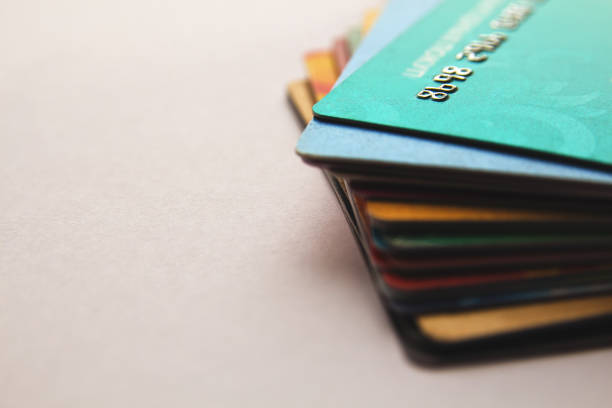 stack of bright colorful discount plastic cards stock photo